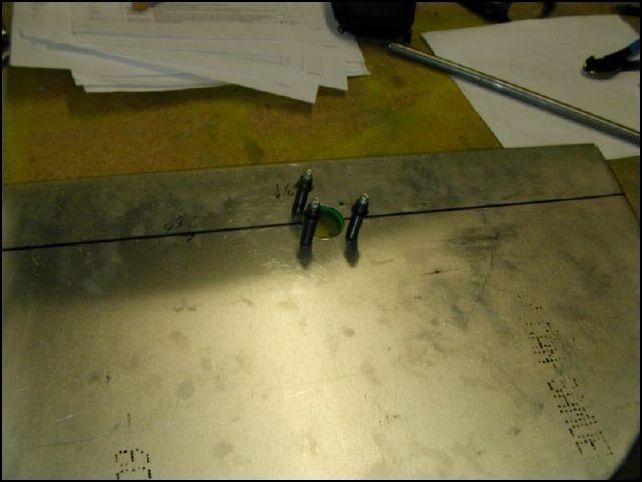 Drill cleco and then bolt the control arm bearings and stiffeners to the instrument panel.  The drawings say to flush rivet them in place.  Trust me... BOLT OR SCREW them!  I used Flush screws.