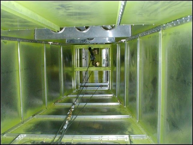 This image shows the control cables in the rear of the fuselage.
