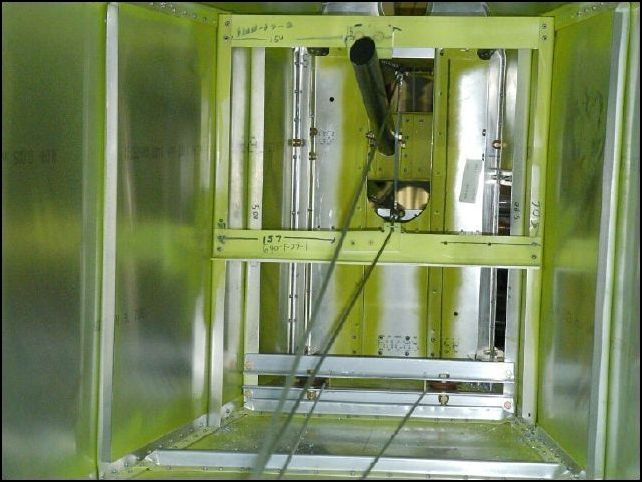 I moved my lower horizontal tail stop down.  Now the lower horizontal tail control cable goes above the stop like the drawings show that it should.  I found that the rear of my fuselage was sagging because I have it off the back of the table and I have my rudder installed.  When you install the rudder it pushes the top longerons up but since I had no support back there it pushed my lower longerons down.  OOOPS.  This has been corrected now and all adjustments have been made again.