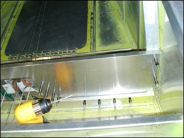 Just another image of the rear seat rear support clecoed to the rear of the rear spar.  There I go with all those rears again.