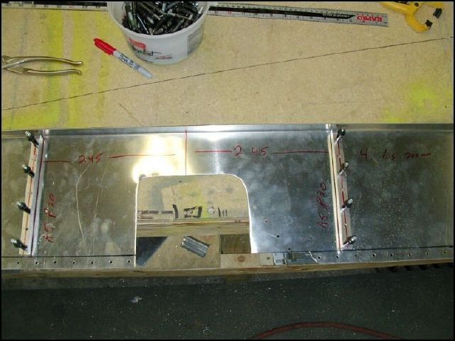 Drill and cleco the Ls to the rear seat support.