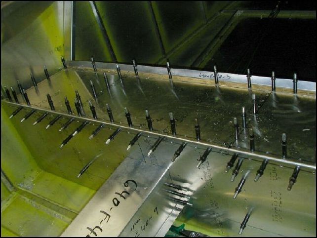 Trim the seat panel so that the front lip is tight against the front seat support.  Drill and cleco.