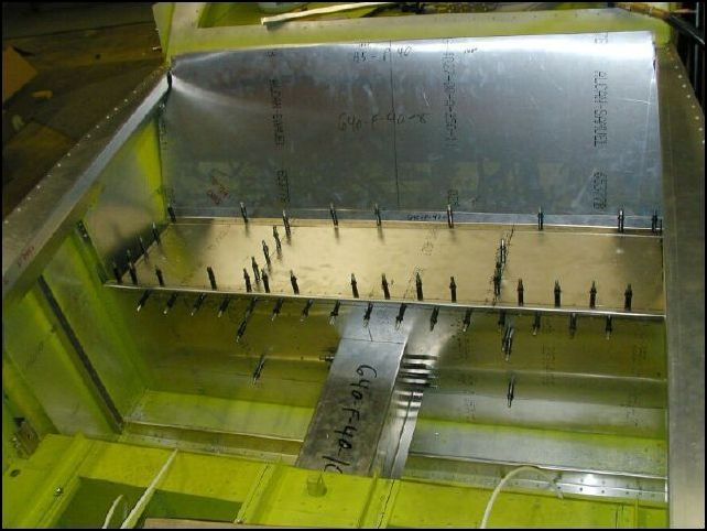 I will drill and cleco the seat back in place before trimming the top.  This way I am sure to have a nice fit at the top of the seat back.