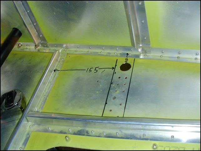 Deburr, clean, and prime the fuselage bottom skin.