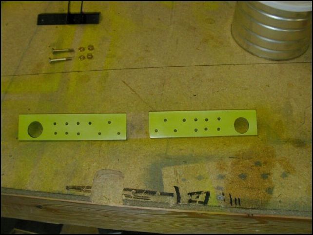 Deburr, clean, and prime the floor stiffeners.