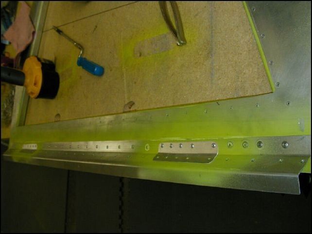 I added two angles to the top of the baggage area bulk head because the rivet holes were a bit sloppy.  Had I had these parts the first time then I would have been able to do this correctly and would not have needed these angles.  All in all they look ok though I guess.