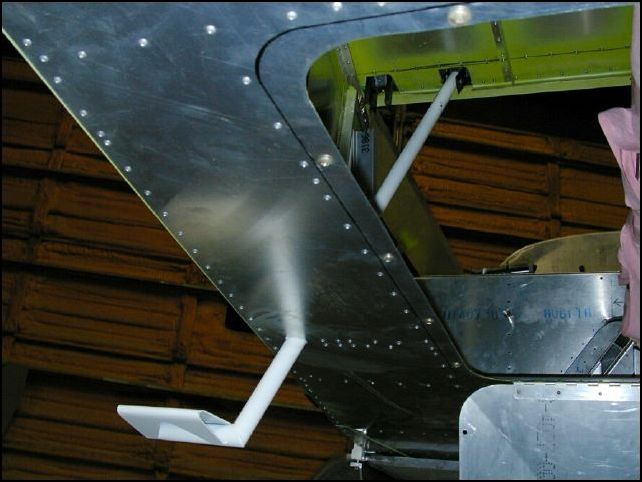 Left step installed viewed from under fuselage