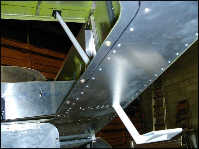 Right step installed viewed from under fuselage