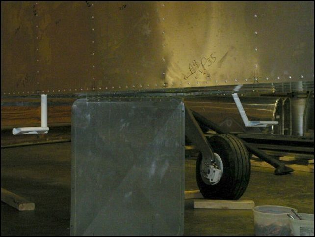 View of steps from pilot side of fuselage