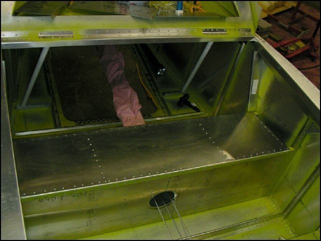 Rivet rear seat bottom and supports.