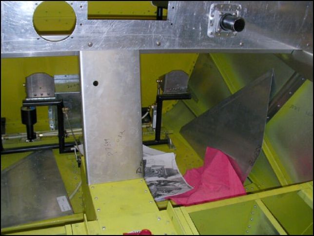 Position center channel to top and bottom L angles.  We will rivet this in place later.