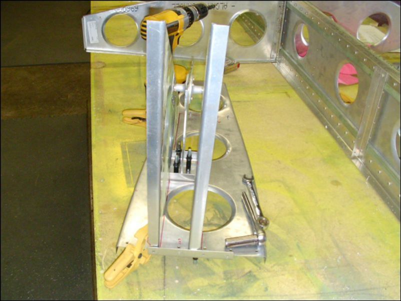 Assemble aileron bell crank and attach to rear rib 7