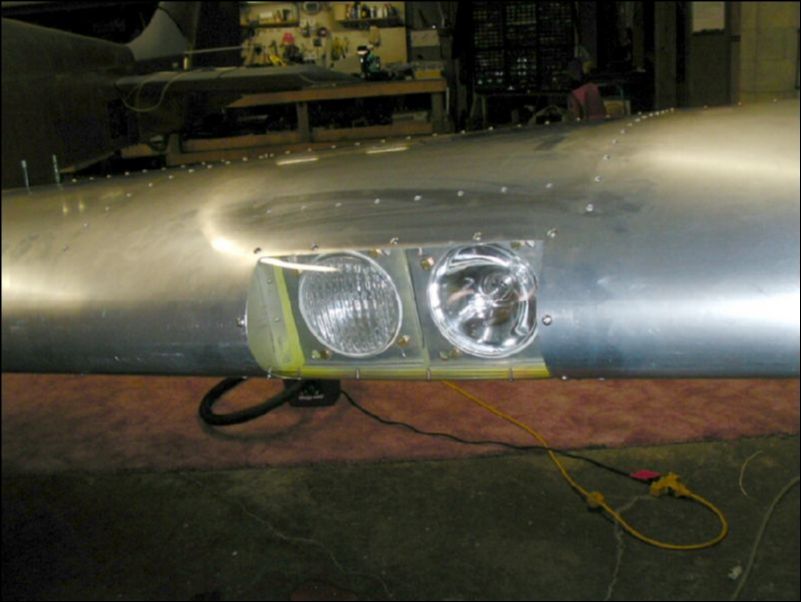 Install landing and taxi light lense.