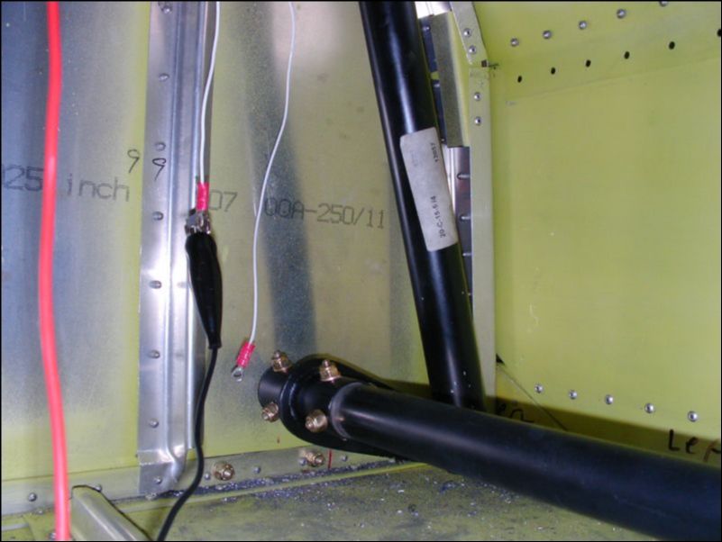 Drill and bolt the flap control bar with both flaps in full up position.  Then adjust the flaps to make sure they both retract fully and deflect to 50 degrees at full deflection.