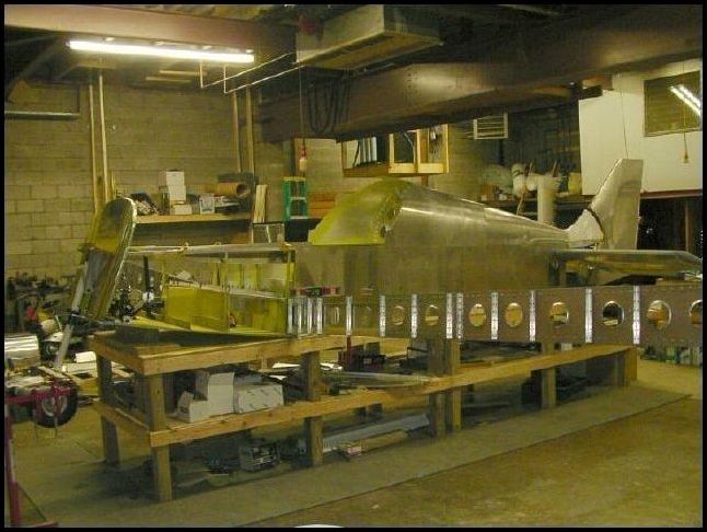 Another image of the wing spar held on to the fuselage with just one bolt for now.  I will build a jig tomorrow to hold the spar in the correct position and then I will drill all of the bolt holes that will hold the wing to the center spar.