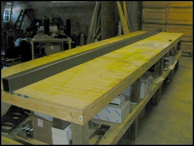 I should have done this sooner, but I did not have a beam to check the table with.  now that I do I removed all parts from my table and checked to make sure that it was perfectly level and flat.