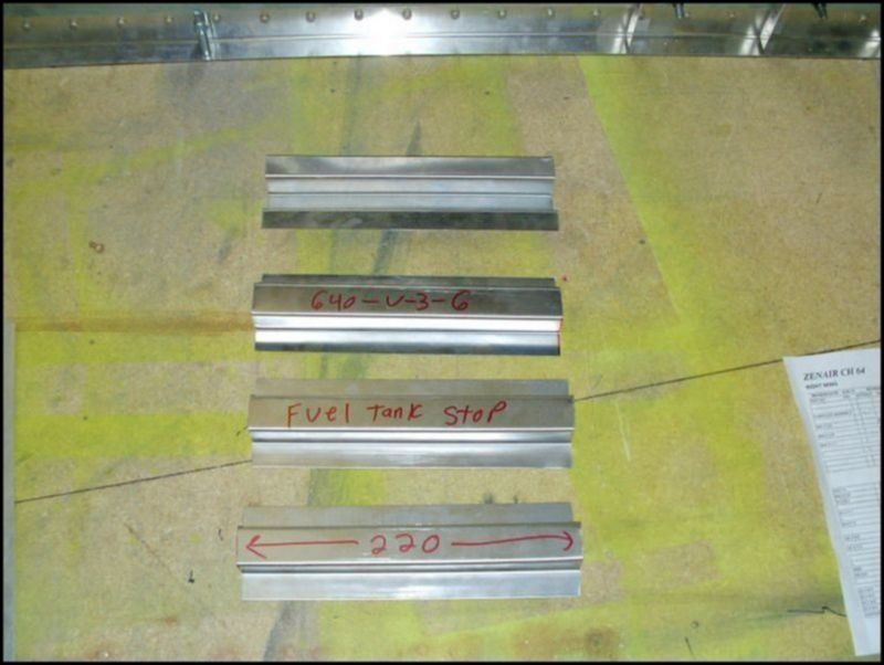 Cut 4 wing tank stops from 640-V-3-6.  You need two for each wing.