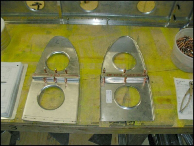 Drill and cleco the wing tank stops to rib 5 and 7.  If you are not installing the extended range fuel tanks then you will install the stops to ribs 5 and 6.  Rib 6 is not installed when installing the extended range tanks.  NOTE: the stop is installed on the flat side of rib 7 and the inside of rib 6.  I don't know why Zenair did not have us mount the rib so that both ribs would have the flat side toward the fuel tank, but this is how the drawing shows them.