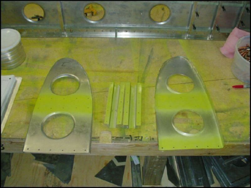 Deburr, clean, and prime the fuel tanks stops and nose ribs 5 and 7.