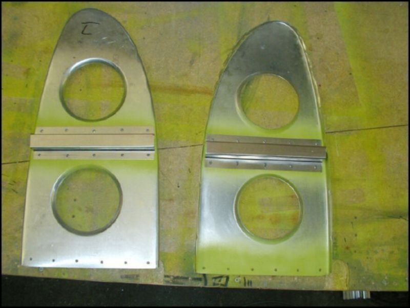 Rivet the fuel tank stops to nose ribs 5 and 7.