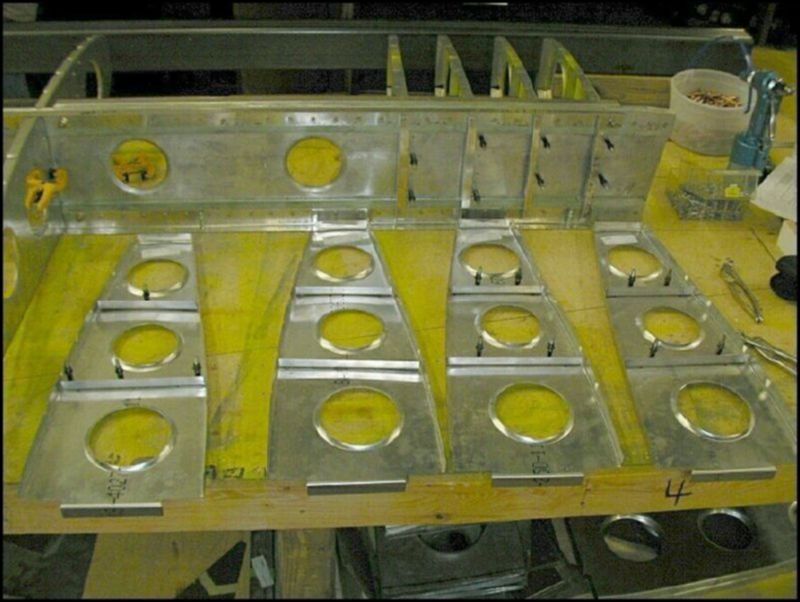 Cut stiffening Ls for rear ribs 1 - 4.  Drill and cleco the the Ls to rear ribs 1 - 4.