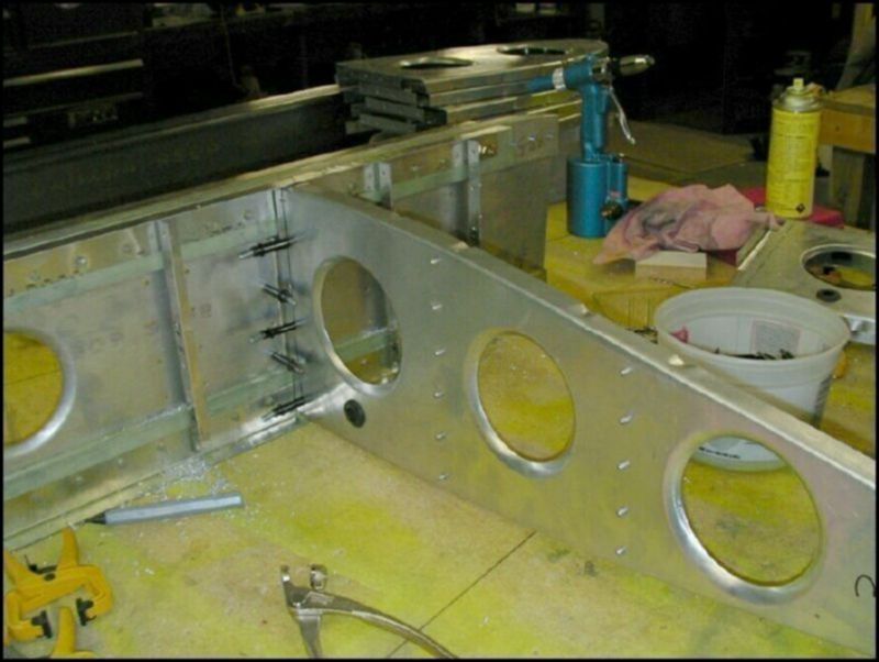 Rivet the Ls to rear ribs 1 - 4.  Drill holes for wires in all rear ribs and install grommets.  Drill and cleco all rear ribs to the wing spar.
