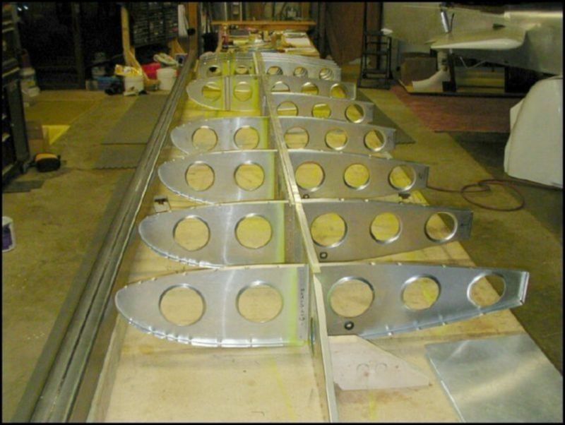 Rivet all ribs to wing spar