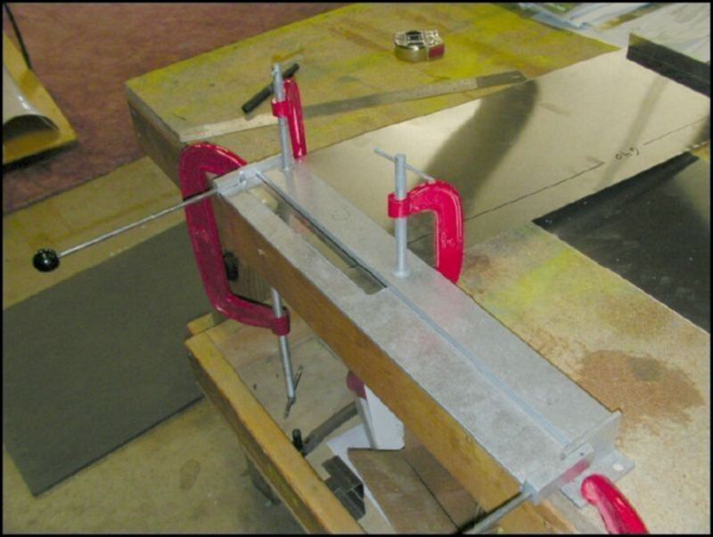 Mark 20 mm from each end and bend 90 degrees on this mark.