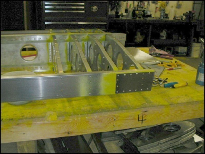 This image shows the inboard rear channel and rear channel doulber riveted to the rear ribs.  Make sure that you do NOT install any rivets that the drawings show will be installed later.