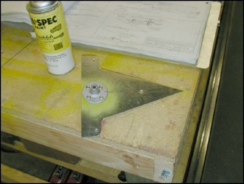 Deburr, clean, prime, and rivet the bellcrank spools to the bellcrank.  Use solid rivets AD5.