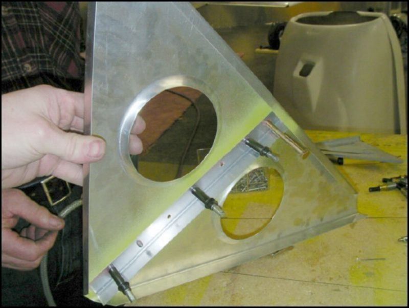 Install L angle to bellccrank supports.