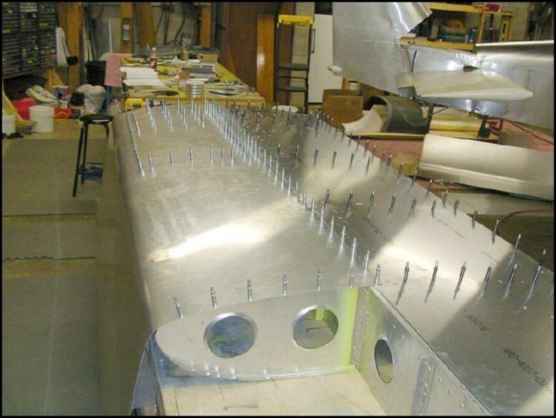 Drill and cleco the bottom rear OB skin.  This image does not show it very well, but I forgot to take another photo when I had this skin installed.