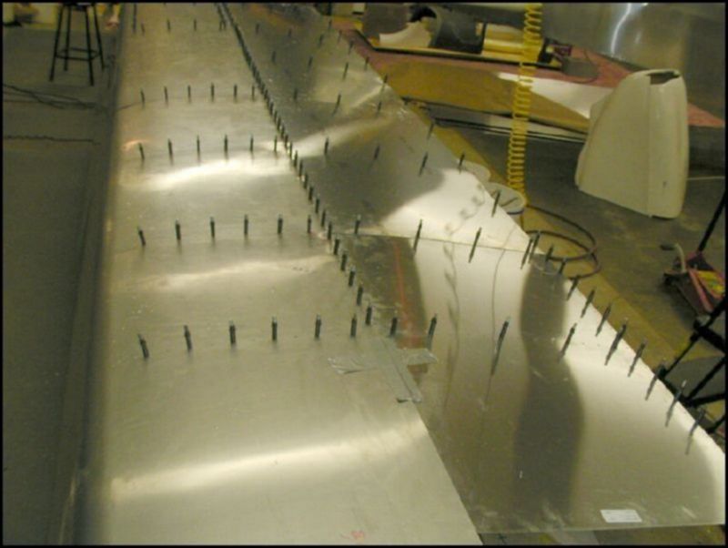 Drill and cleco the bottom of the OB front skin.