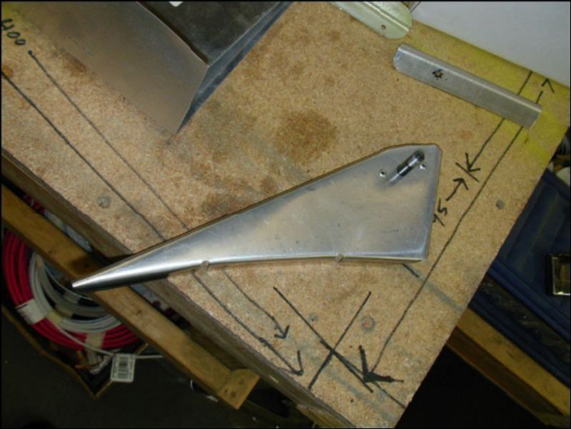 Drill hole and rivet locations in the first rib of the aileron for the Aileron control rod bolt.