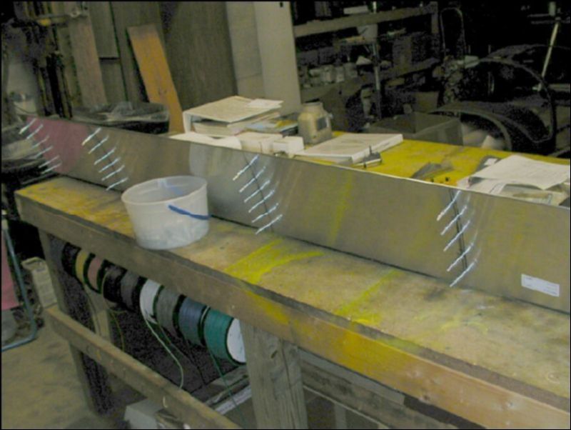 Position, drill, and coleco the four aileron ribs inside the aileron skin.