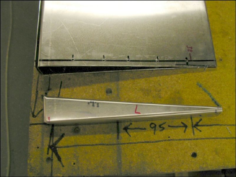 Make sure that you have the correct ribs for the flap you are working on.  The top of the flap is flat and the bottom is at an angle.