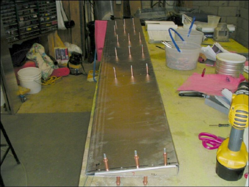 Drill and cleco flap ribs to flap skin top and bottom.