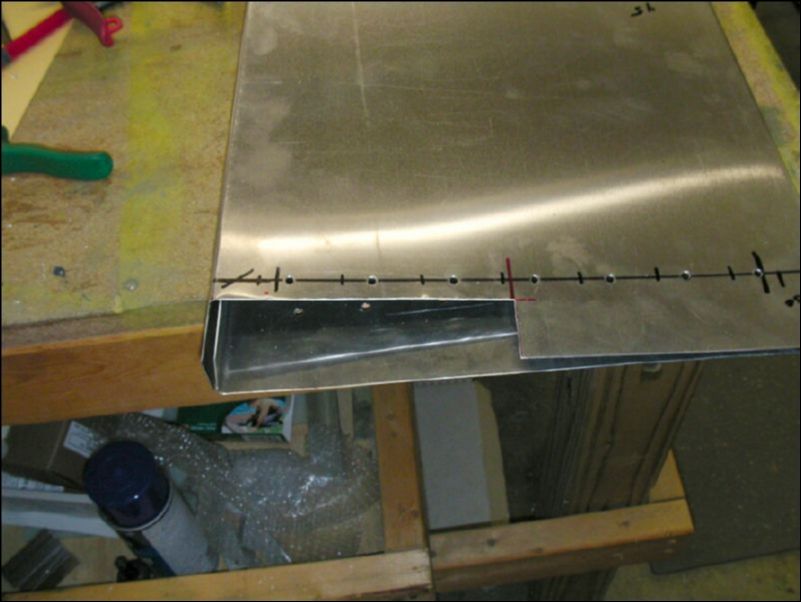 cut out top IB end of flap skin for the control horn.