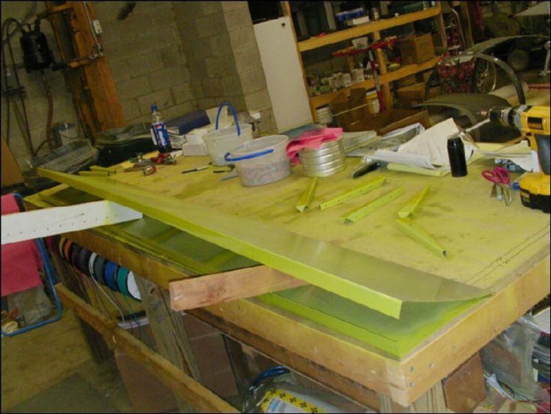 Deburr, clean, and prime all flap parts.