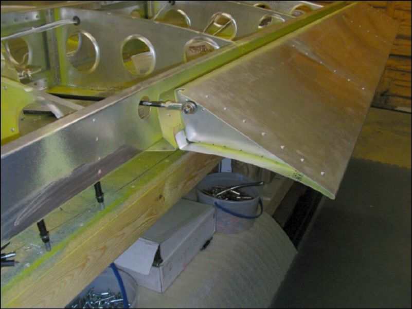 Connect the aileron rod from the bellcrank to the aileron.