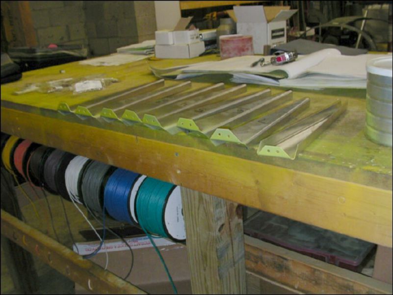 Deburr, clean, and prime riblets.