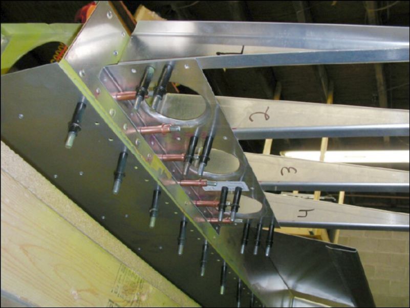 Drill and cleco inboard gusset to bottom of riblets.