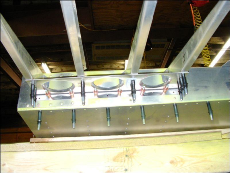 Drill and cleco inboard gusset to bottom of riblets.