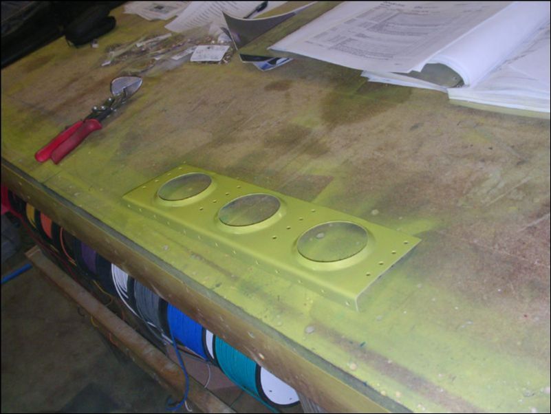 Deburr, clean, and prime inboard gusset.