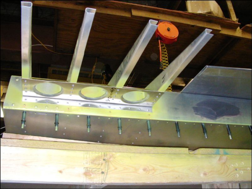 Rivet inboard gusset to riblets.