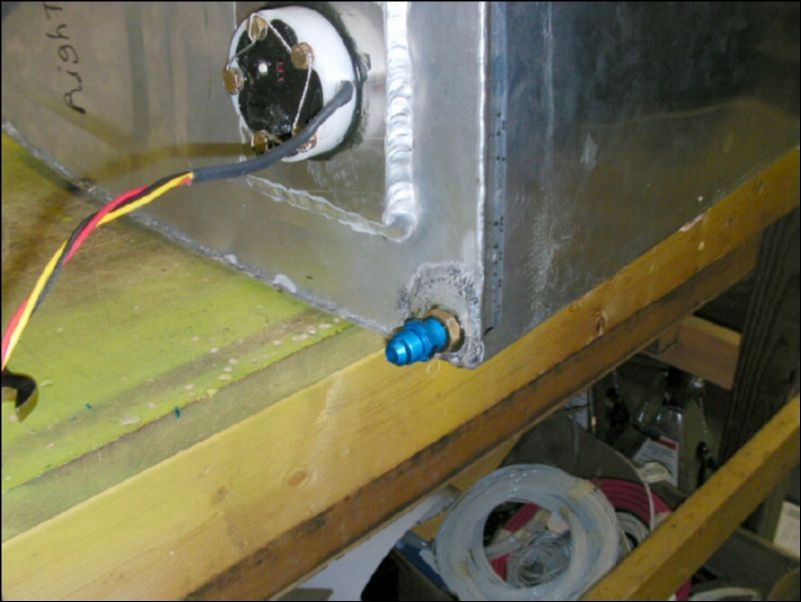 Install fuel strainer screen and fuel line connector to fuel tank.  I am running flared tube instead of rubber lines so I installed a flared end.