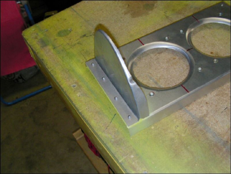 Install rib spacer on landing and taxi light assembly.  NOTE:  This rib spacer is on backwards.  The reason for this is that the landing light is supposed to be installed in the left wing only.  However I am installing lights in both wings so I had to install the rib spacer backwards for the right wing.  I will probably have to make the light cover smaller on the right wing because of this.