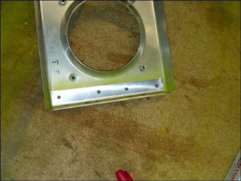 Install L on the back of the landing light assembly