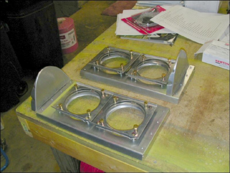 Build the landing light assembly for the left wing.  Notice that the rib spacer is on correctly for the second assembly.