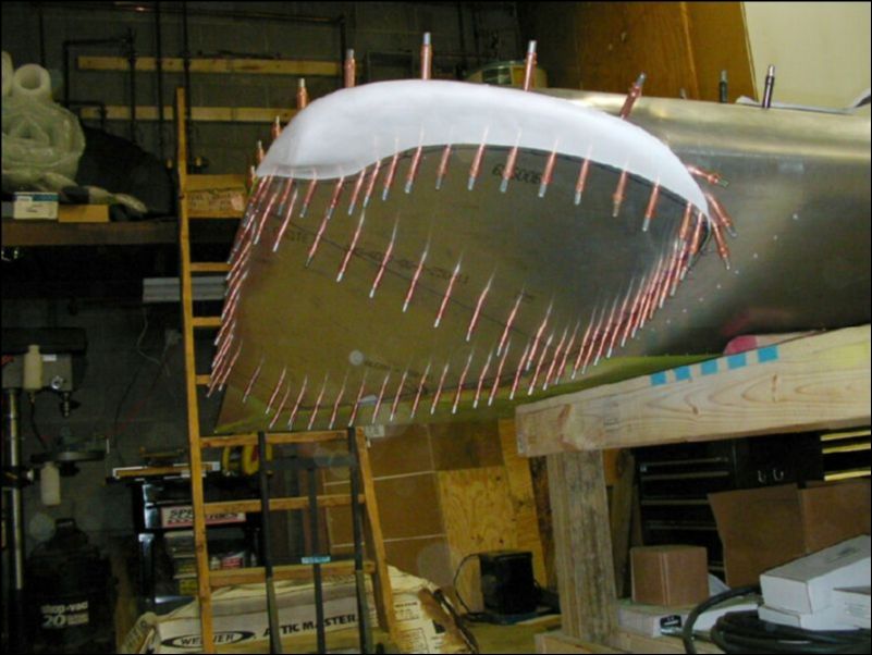 Drill and cleco the wing tip bottom skin to the Ls.